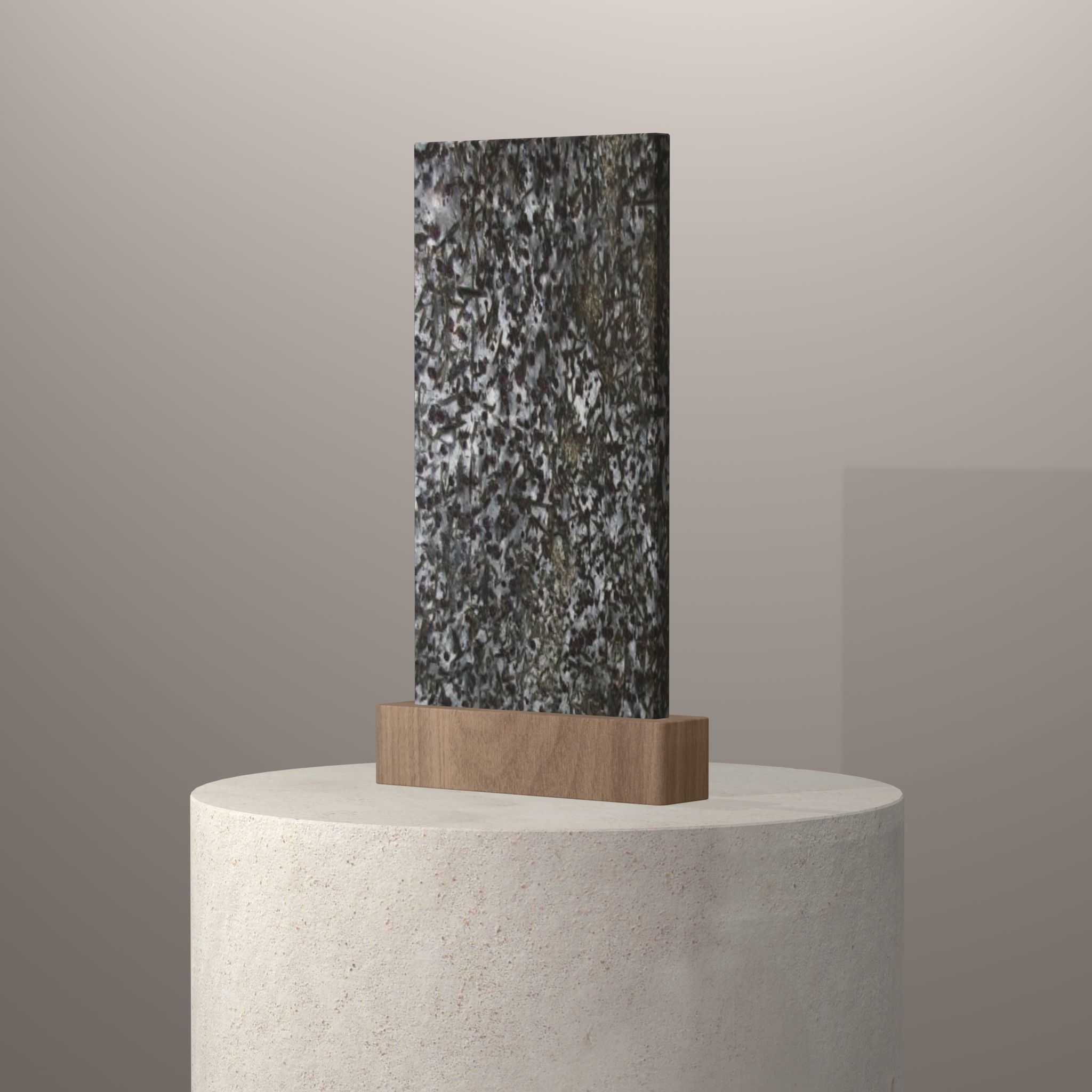 Rendu 3D du coloris Meteoro en Granit Texta sur piédestal
