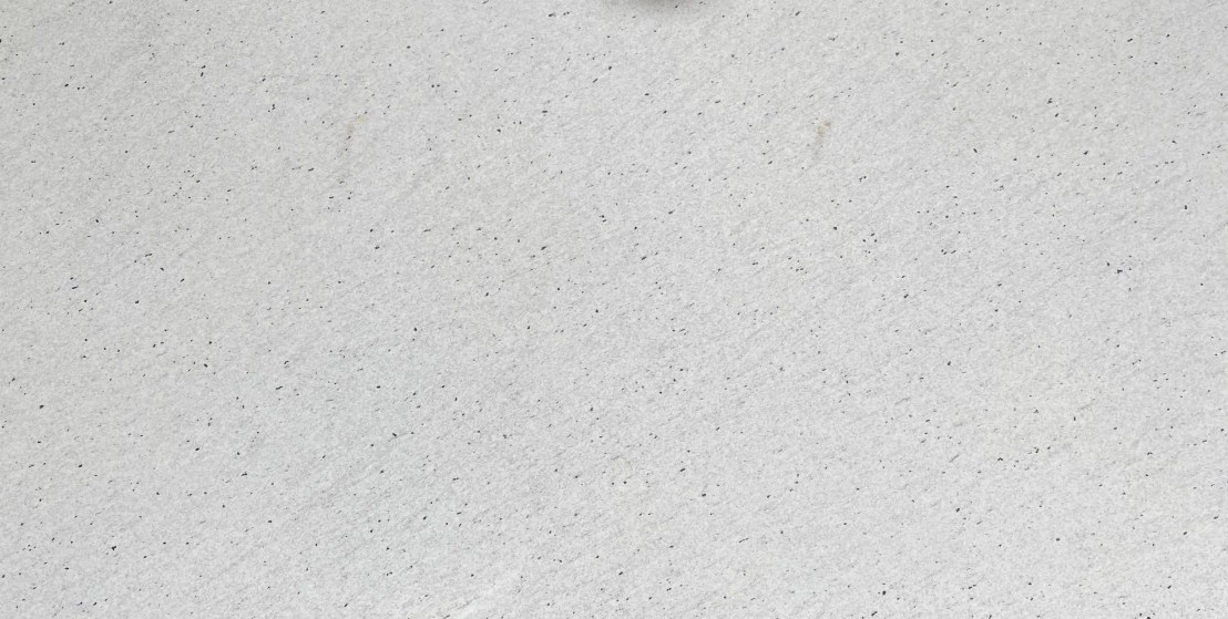 Épaisseur et finition de tranche du coloris Rebel White en Granit Texta