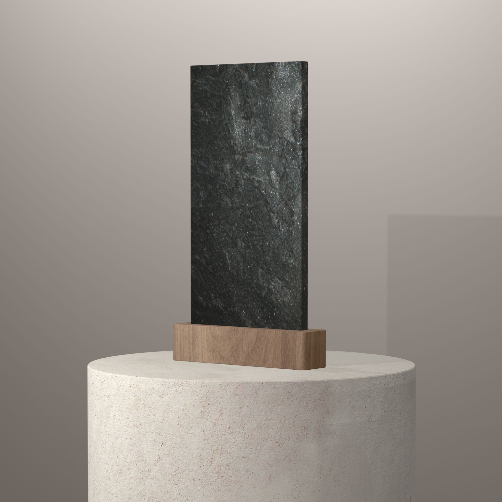 Rendu 3D du coloris Black Tear en Granit sur piédestal